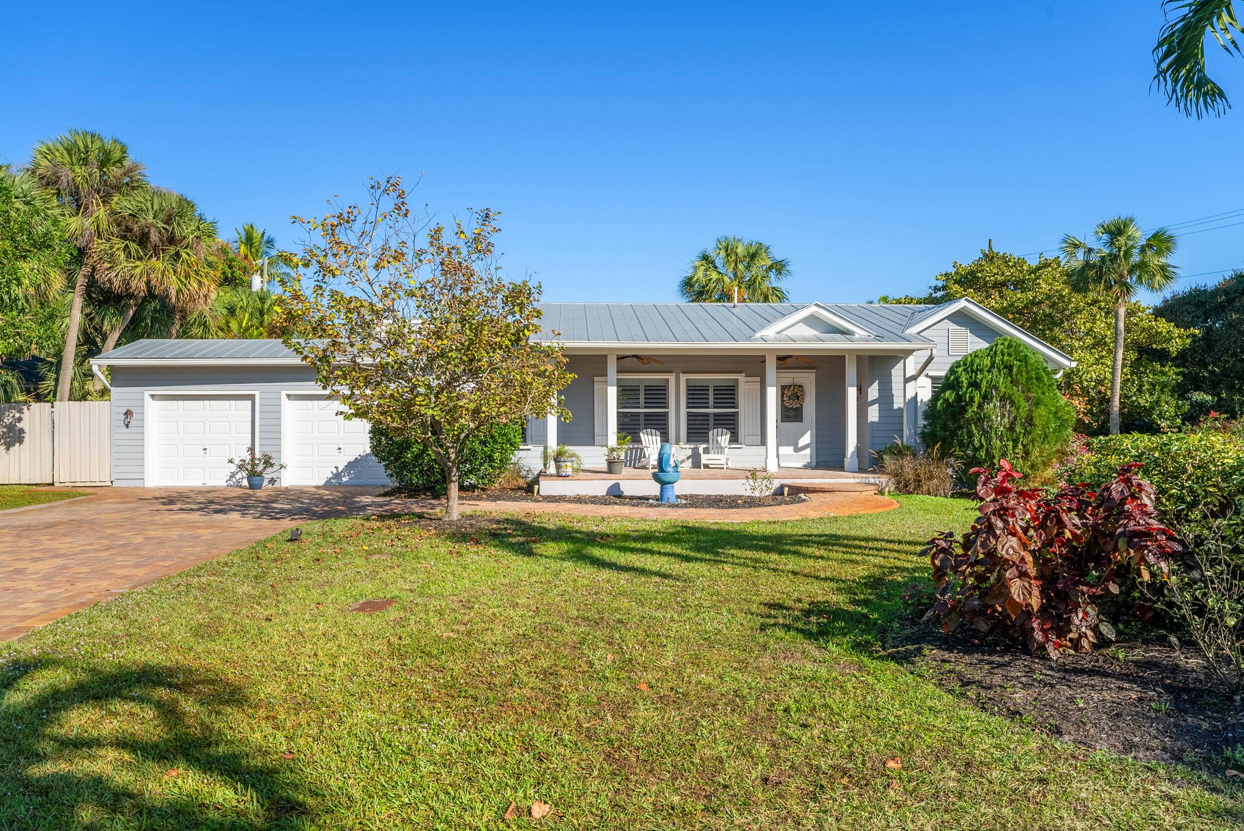 Welcome to 229 SE Oriole Ave, a rare opportunity in the sought after St.