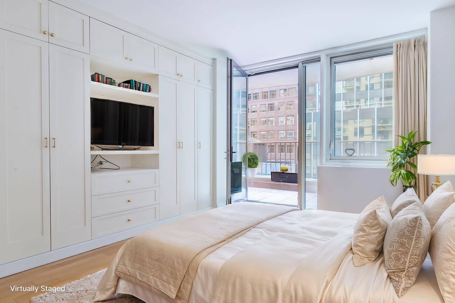 Residence 6F at L'Ecole Condominium is a spacious 2 bedroom, 2 bath home featuring the largest private terrace in the building.