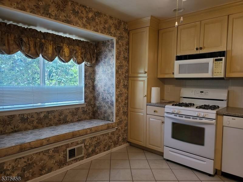 Welcome to this space savvy, 3 story multi level townhome, where comfort meets convenience.
