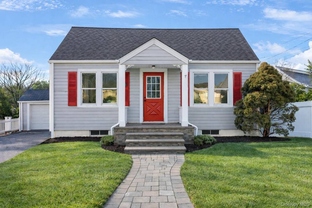 Fully Renovated Cape in East Northport Move In Ready.