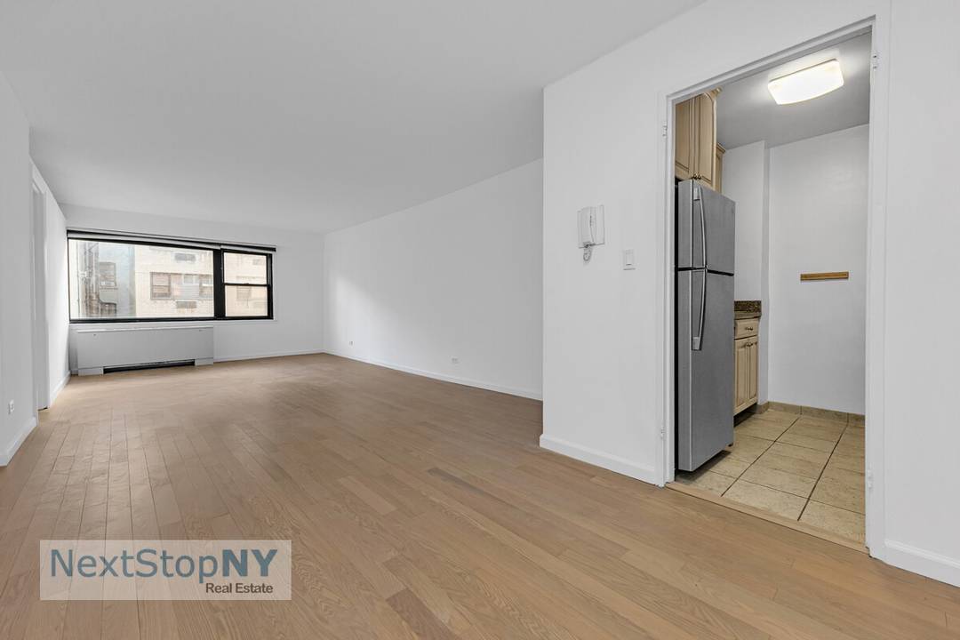 This sun filled, extra large Junior one bedroom has been beautifully updated with brand new flooring.