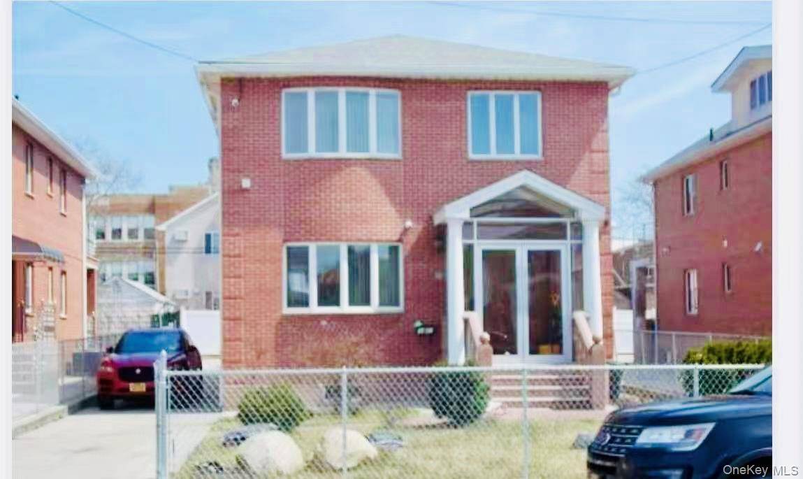 Beautiful Brick young large one family on a quiet tree lined street.