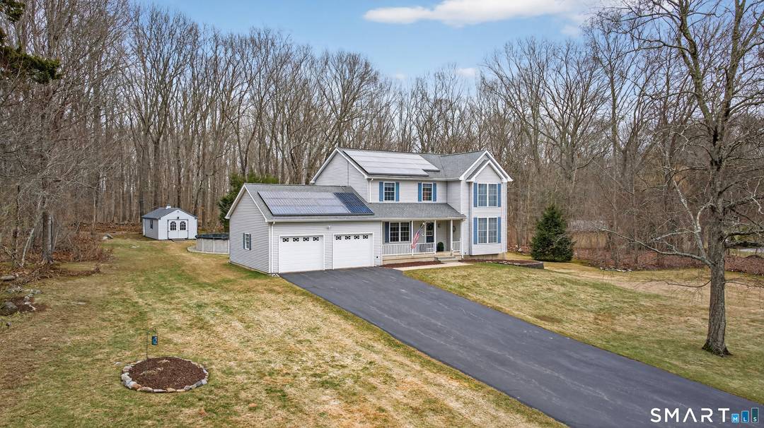 This inviting three bedroom, two and a half bath colonial is nestled on a peaceful dead end street in Preston.