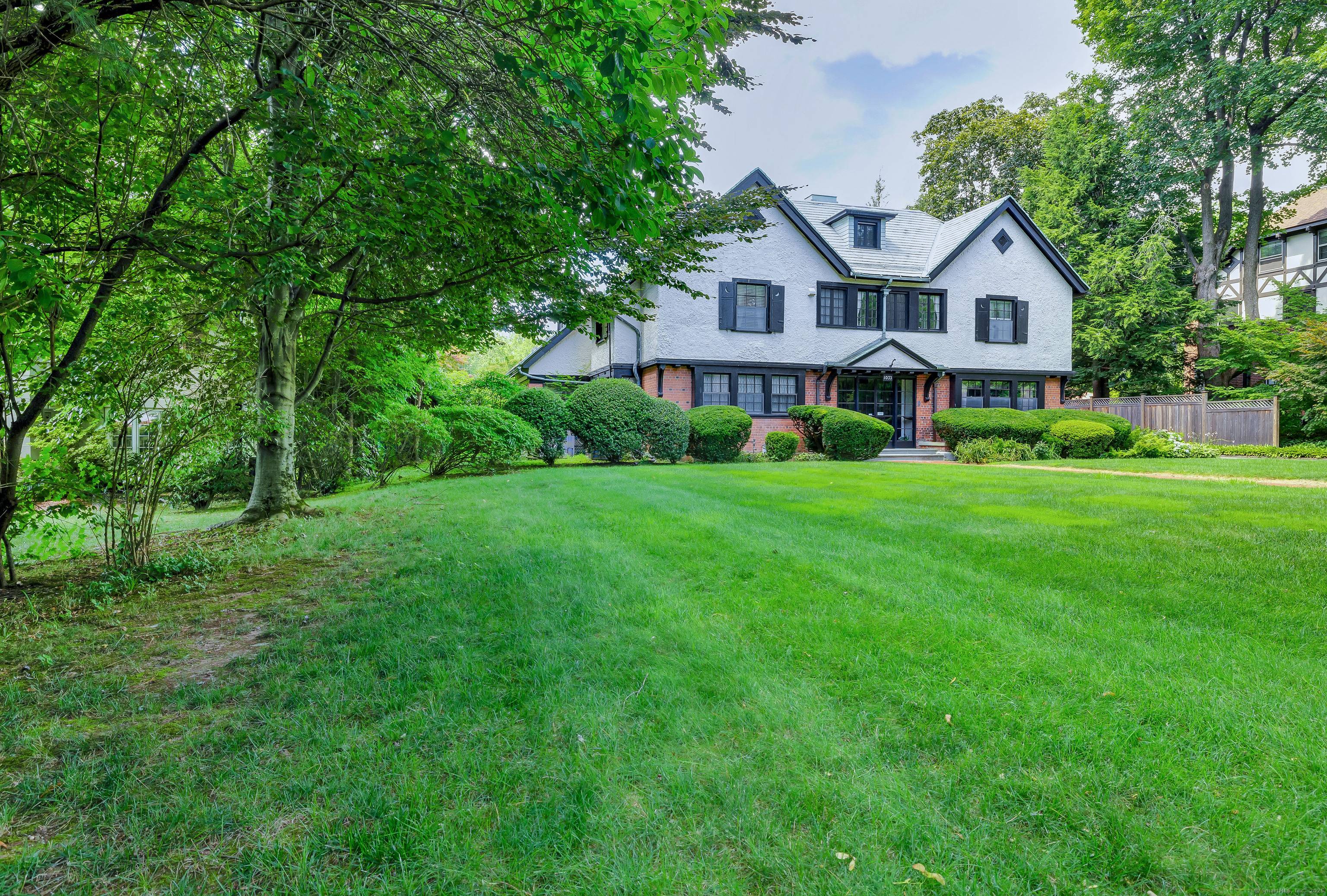 Wonderful arts and crafts style English Cottage built in 1907 is in close proximity to Elizabeth Park.
