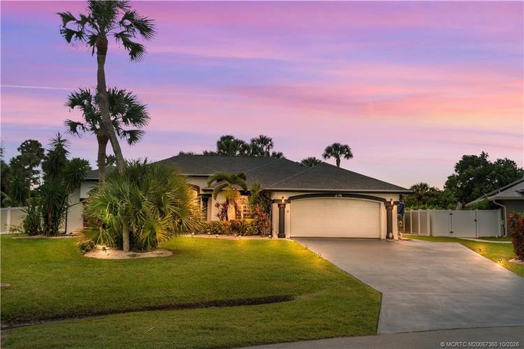 Spacious amp ; bright, this CBS home sits on nearly 1 2 an acre offering privacy amp ; room to relax.