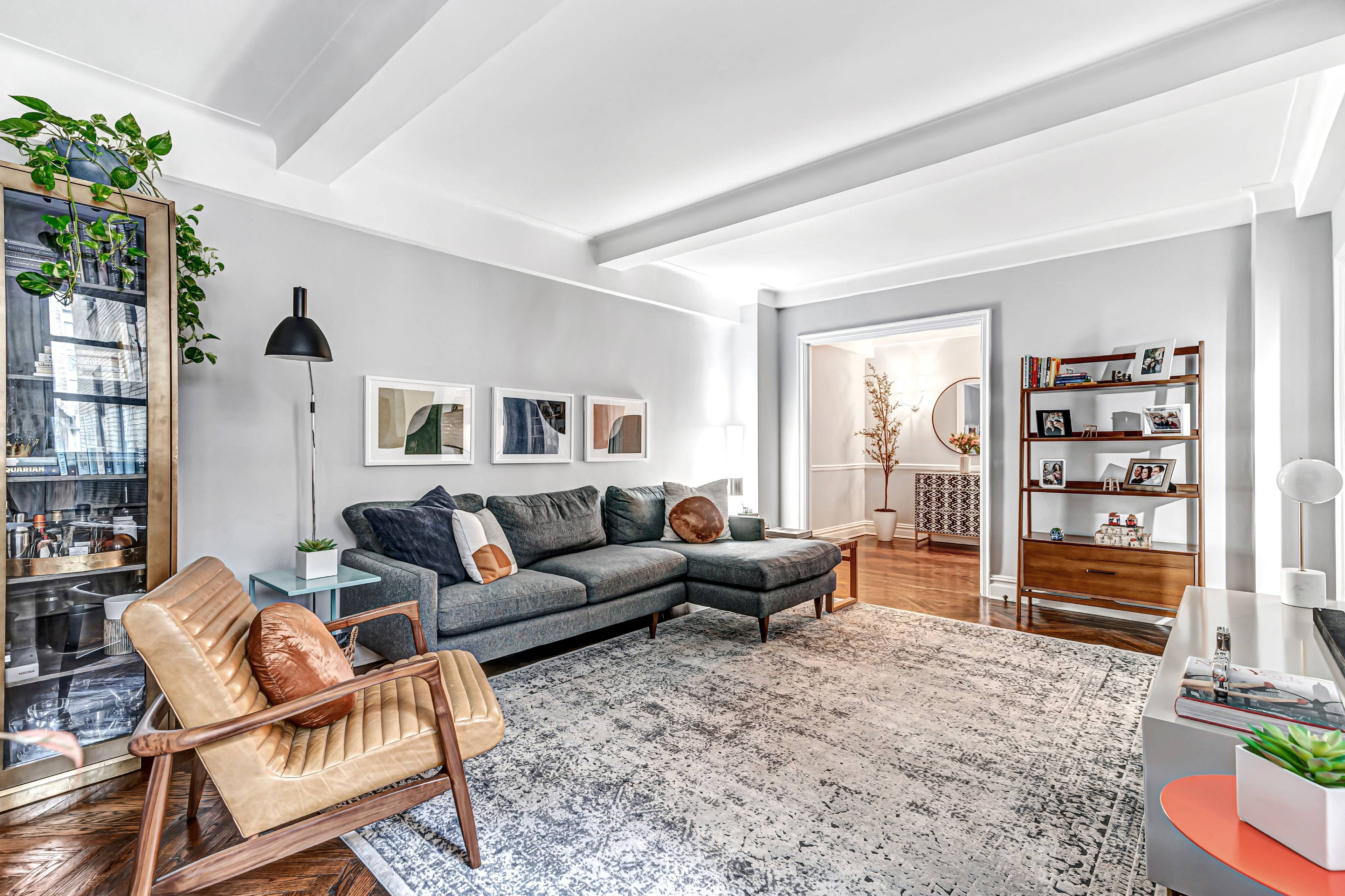 Move right into this pristine two bedroom, one and one half bathroom residence where a stylish renovation elevates classic prewar details to cultivate an atmosphere of timeless sophistication.