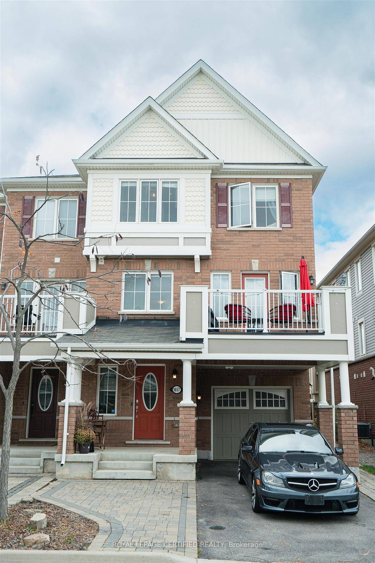 Modern End Unit Townhome with a Semi Detached Feel !