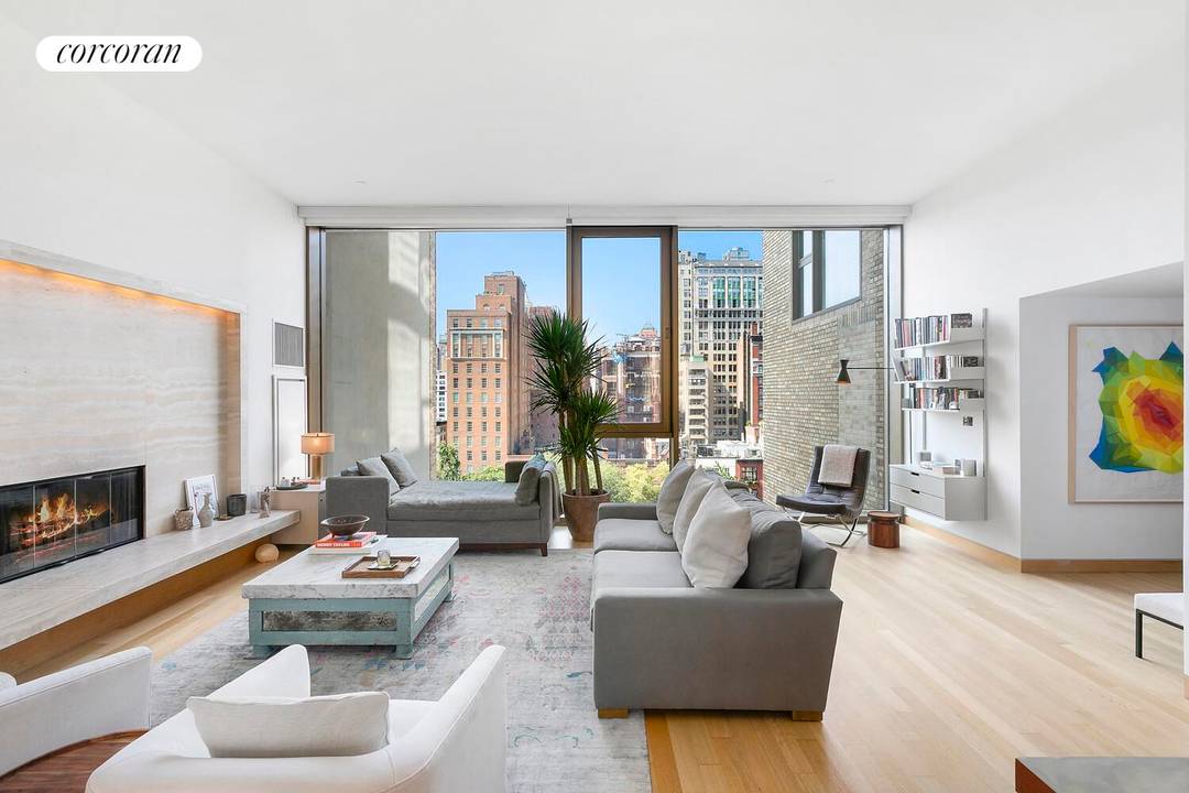 Perfectly appointed high floor two bedroom two and a half bath with a southern facing 40 foot expanse of floor to ceiling windows overlooking exclusive Gramercy Park.