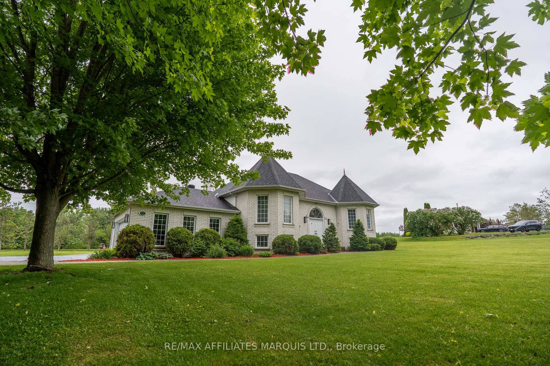 This one of a kind brick bungalow blends modern living with classic elegance.