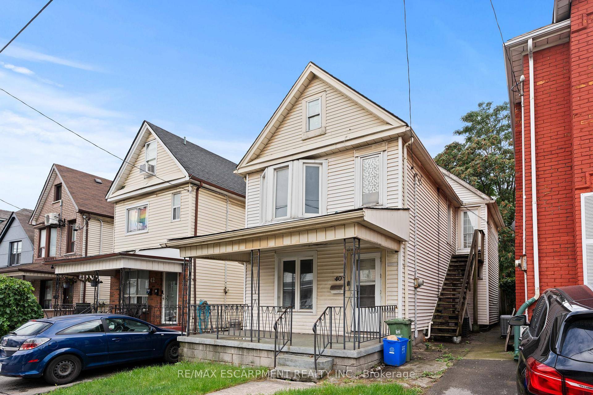 This huge six bedroom, 2 story detached home is just a two minute walk from Tim Hortons Field and is packed with potential !