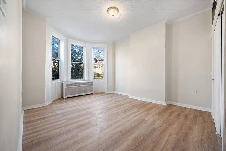 Spacious, newly renovated 2 bedroom with private outdoor space in the heart of Kensington.