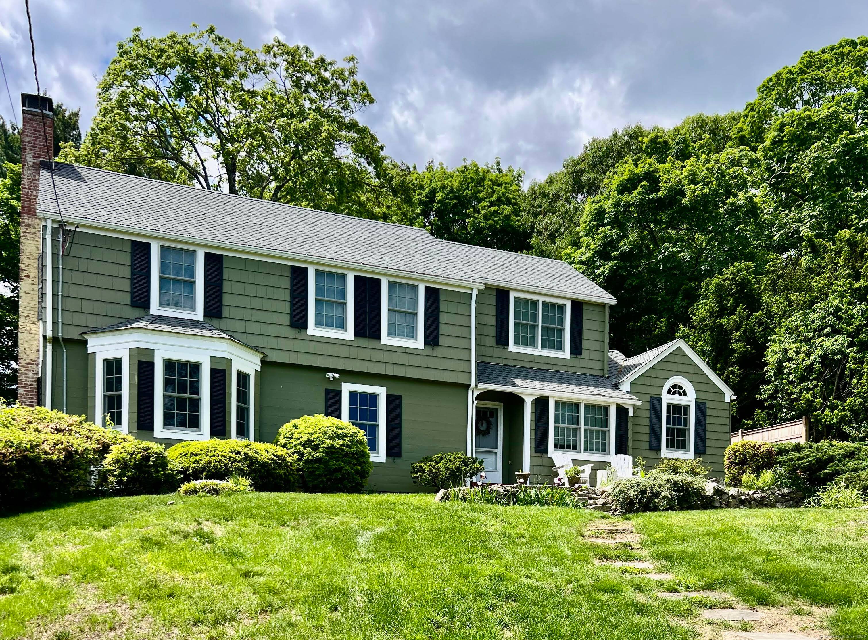 Live on one of Darien's most beautiful waterfront streets and enjoy living across the street from the Long Island Sound !