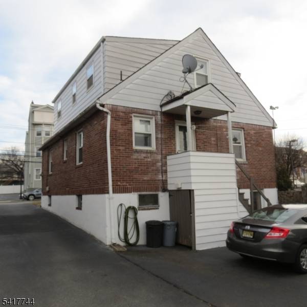 Well Kept Brick Cape Cod updated throughout the years with newer windows, roof, electric, furnace, hot water heater, split A C unit.