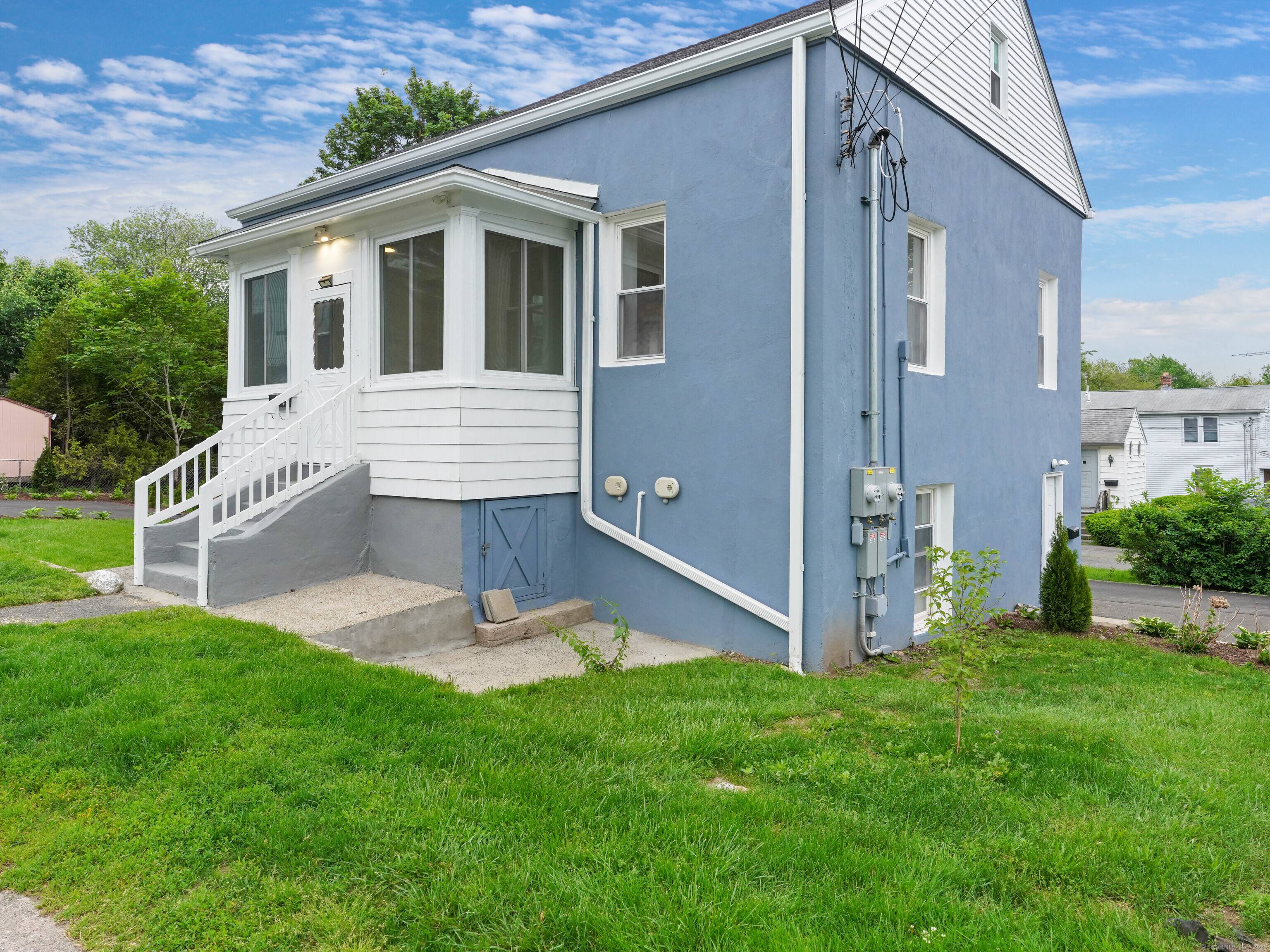 Beautifully renovated 2 family located on quiet side street 2 separate off street driveways.