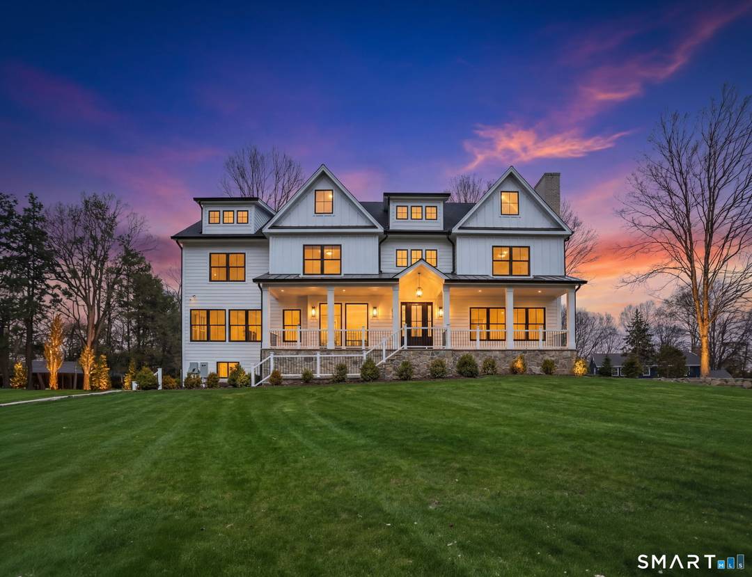 Welcome to 150 Wildwood Road, an exceptional new construction residence that perfectly blends timeless colonial architecture with modern sophistication.