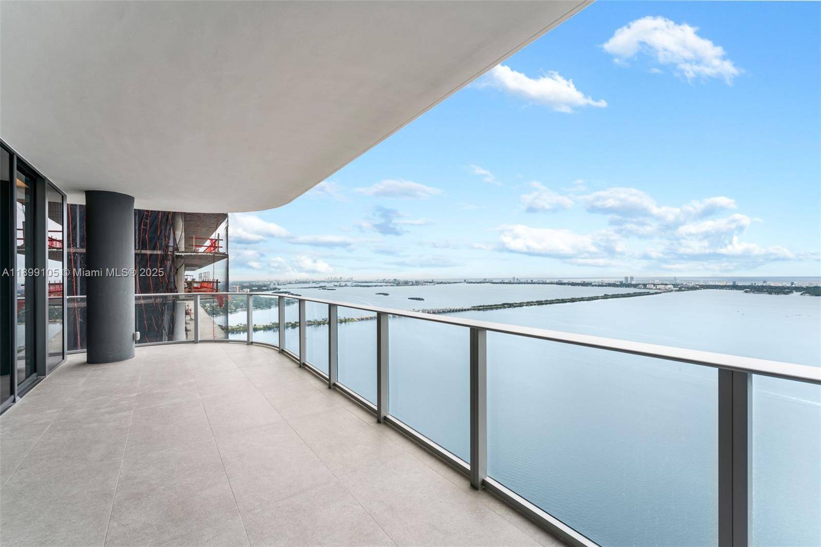 Spectacular high floor residence at Aria Reserve South Tower, Line 01 54th floor, featuring 4 bedrooms office with direct Biscayne Bay and Ocean views.
