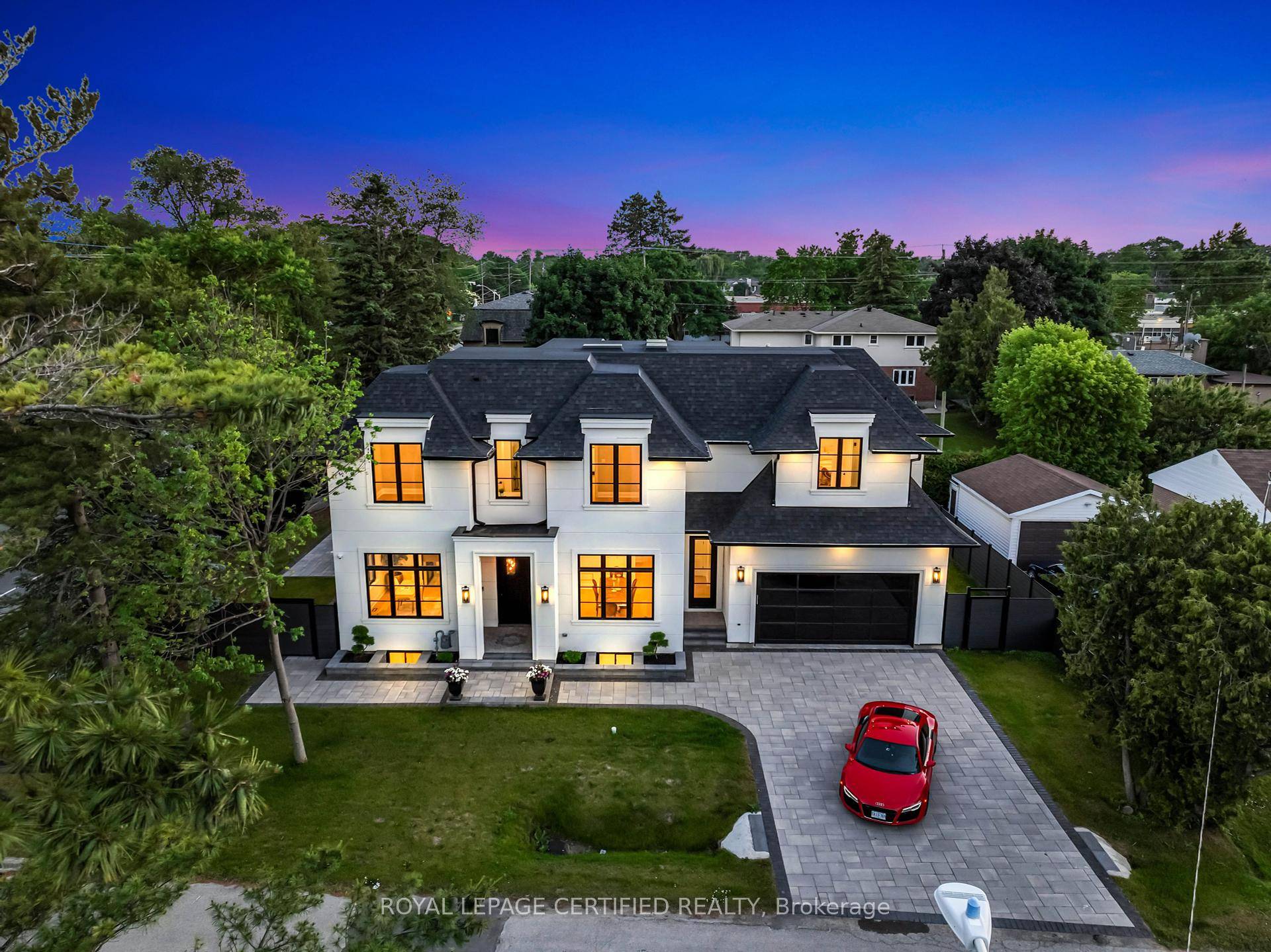 Live just steps from Lake Ontario in prime Southwest Oakville.