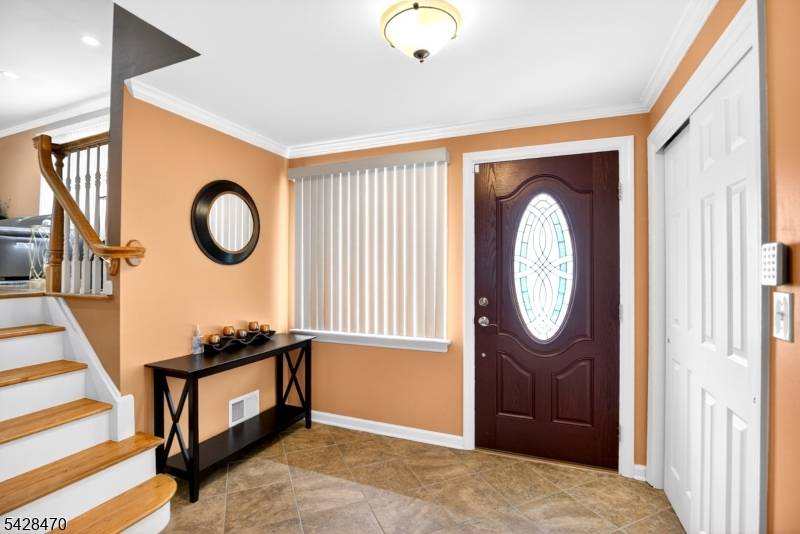 Experience this stunning 3 bedroom, 2 full bath split level home with attractive curb appeal that beautifully complements its staggered design.