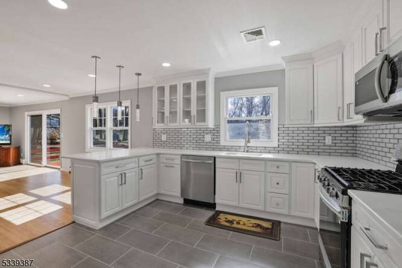 Welcome to this beautifully updated 4 bedroom, 2.