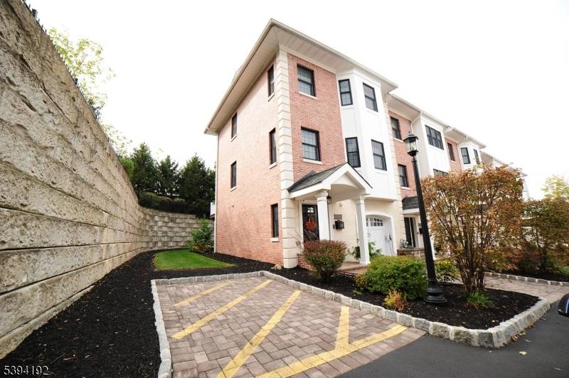 Welcome to this stunning, meticulously maintained 4 story brownstone townhouse located in the heart of Caldwell, NJ.