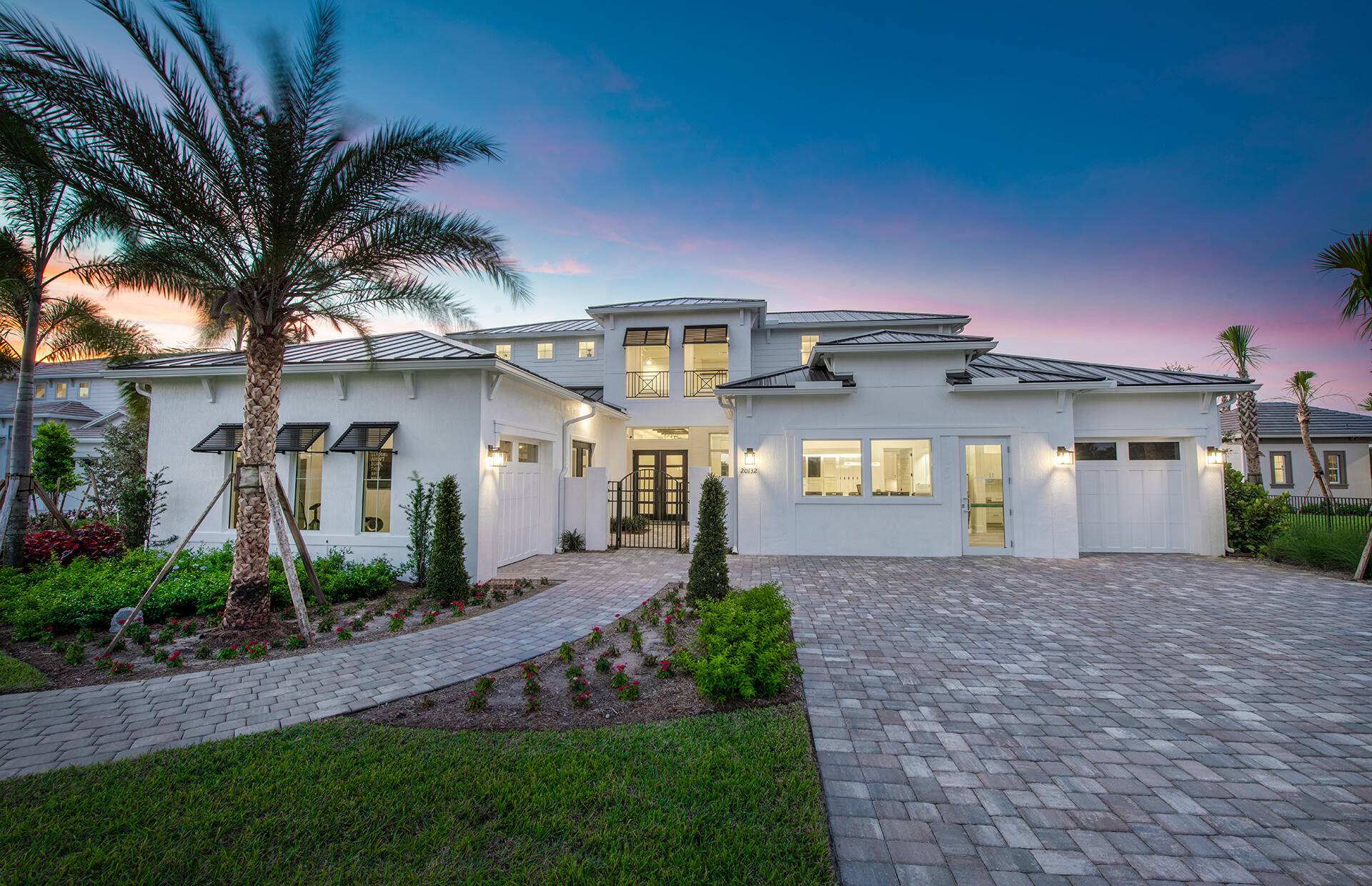 NEW CONSTRUCTION Builder's Fully furnished and opulently appointed Madeira model home with lavish pool on over 1 acre of land.