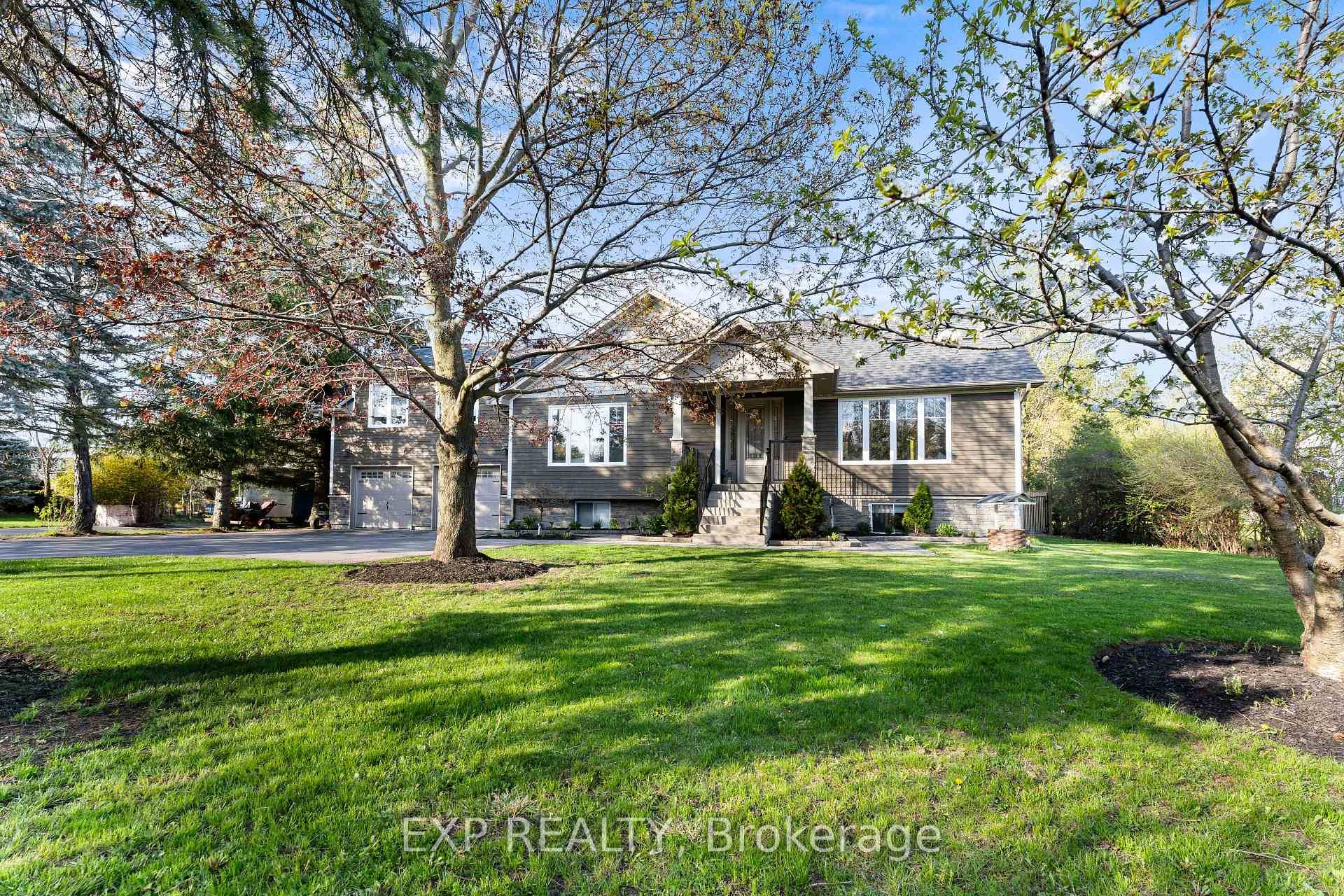 An exceptional bungalow built in 2018, offering 3, 000 sq ft of living space on a half acre lot.