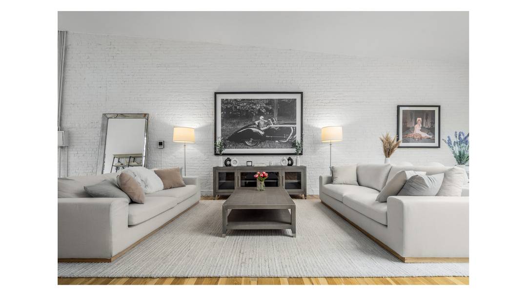 Opportunity awaits for you to create your own Duplex loft of approximately 4100 sq ft for both floors with outdoor space and a decorative fireplace.