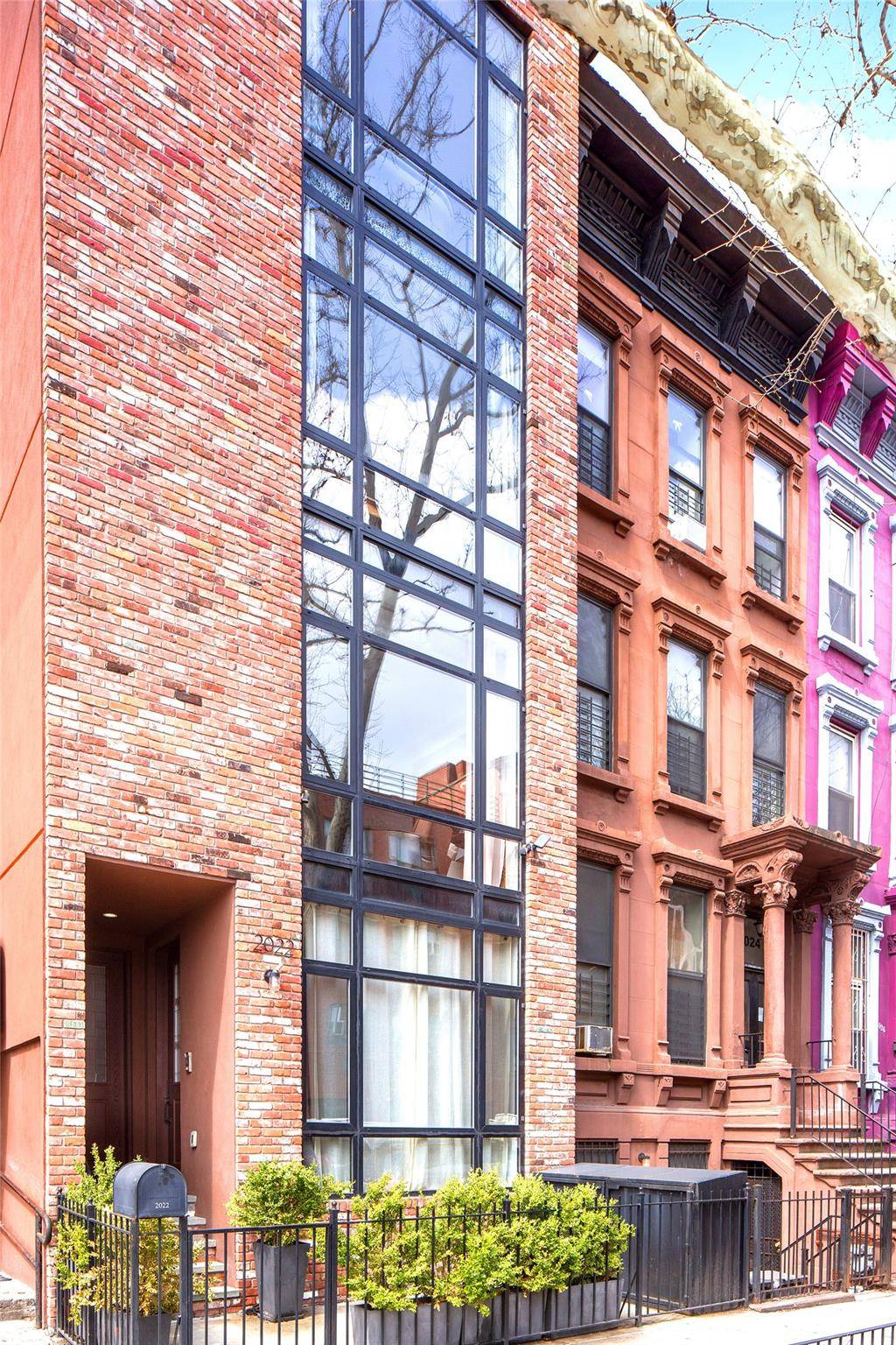 This gorgeous five floor Two Family Townhouse brings all the comforts of contemporary living to the rich culture of Central Harlem.