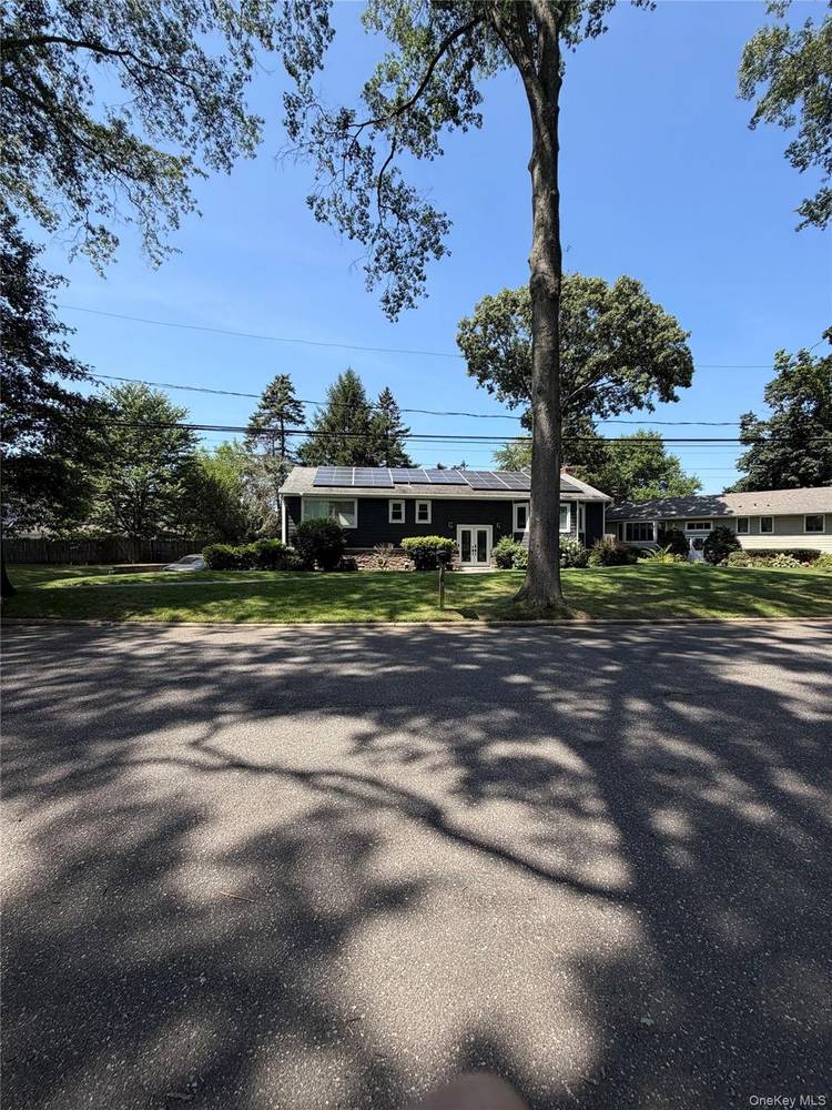 Welcome to a newly renovated high ranch in Huntington.
