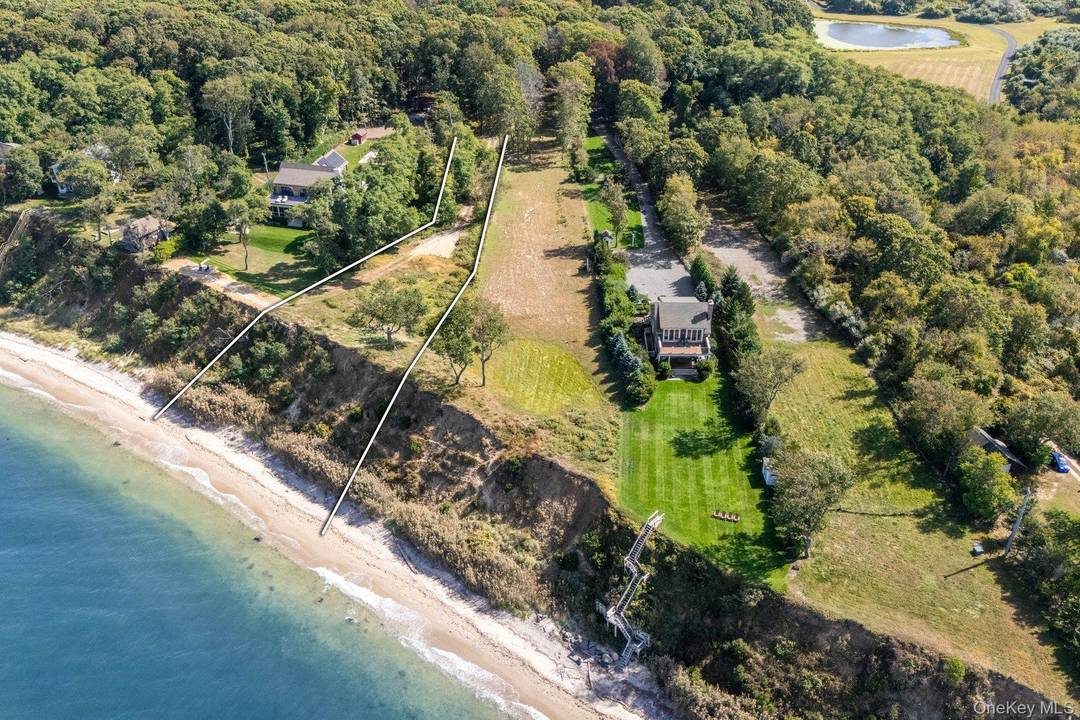 Build your dream home on this exceptional waterfront lot offering unobstructed, forever views and breathtaking sunsets over the pristine waters of the sound.