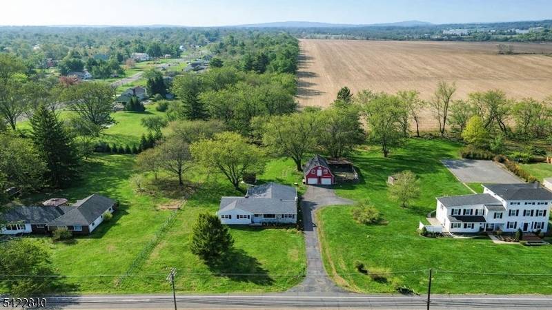 Set on nearly 1. 5 acres, arrive to a setting where open skies, surrounding estates, and a sense of calm create an immediate shift from the everyday.