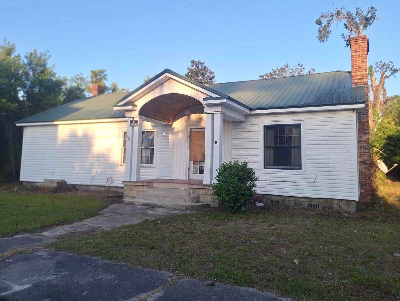 Charming Investment Home with Tremendous Upside.