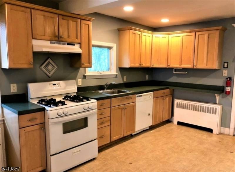 BRING YOUR CONTRACTOR ! VALUE IS IN THE LAND survey in photos media section in this AMAZING Investor or Owner Occupant Opportunity.