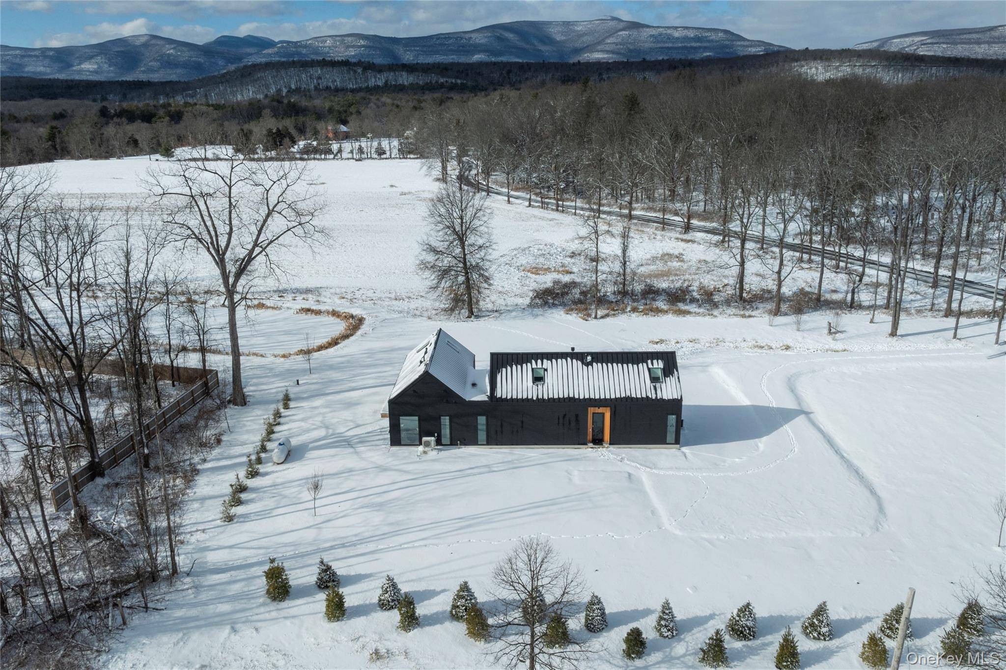 This exquisite home, masterfully designed, and flawlessly brought to life by Dynamism Built, epitomizes a refined curation of high end finishes, premium materials, and bespoke craftsmanship.