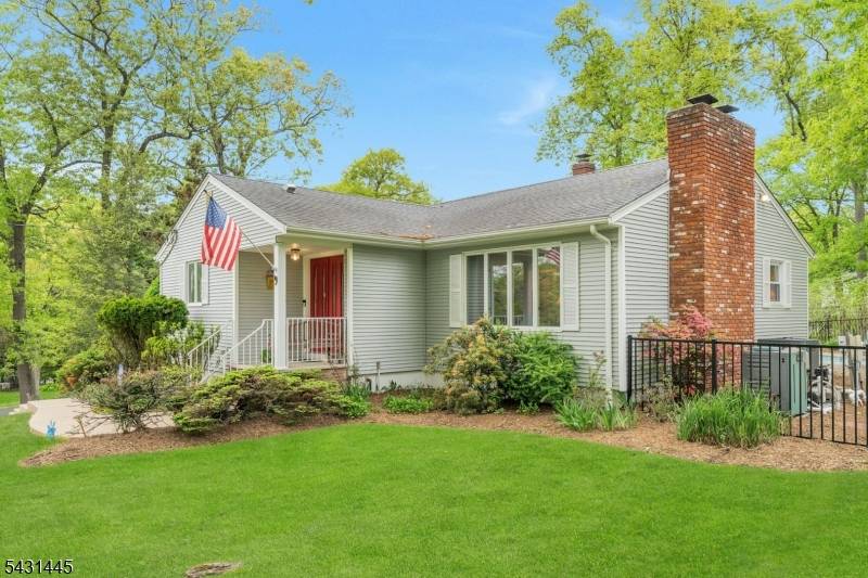 Perched atop a corner lot with surrounding views in Oakland's desirable Dogwood section, this 3 bedroom, 2.