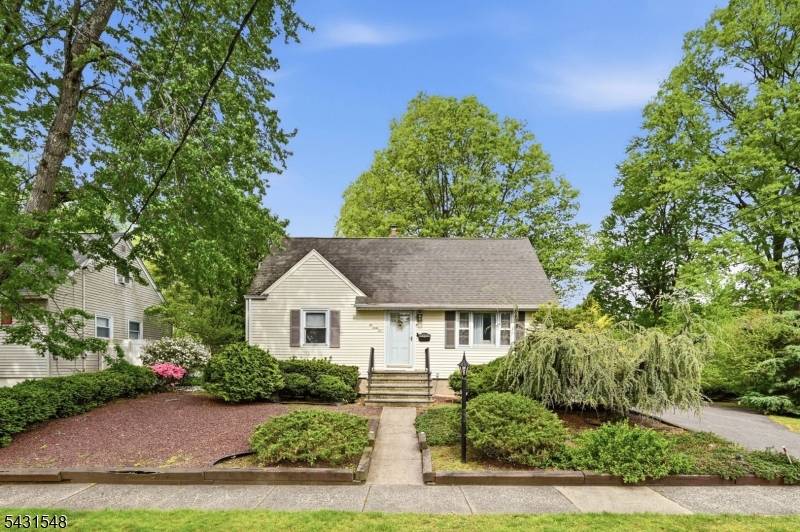 Welcome home to this charming Cape Cod style home offering maintenance free vinyl siding, beautiful curb appeal, and a private park like backyard setting.