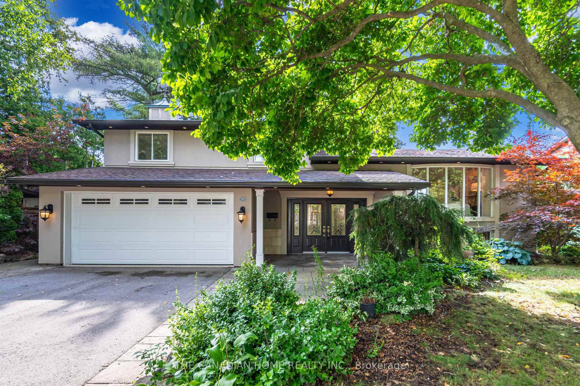 Stunning 4 level home offering 1, 669 sq ft in highly sought after Roseland.