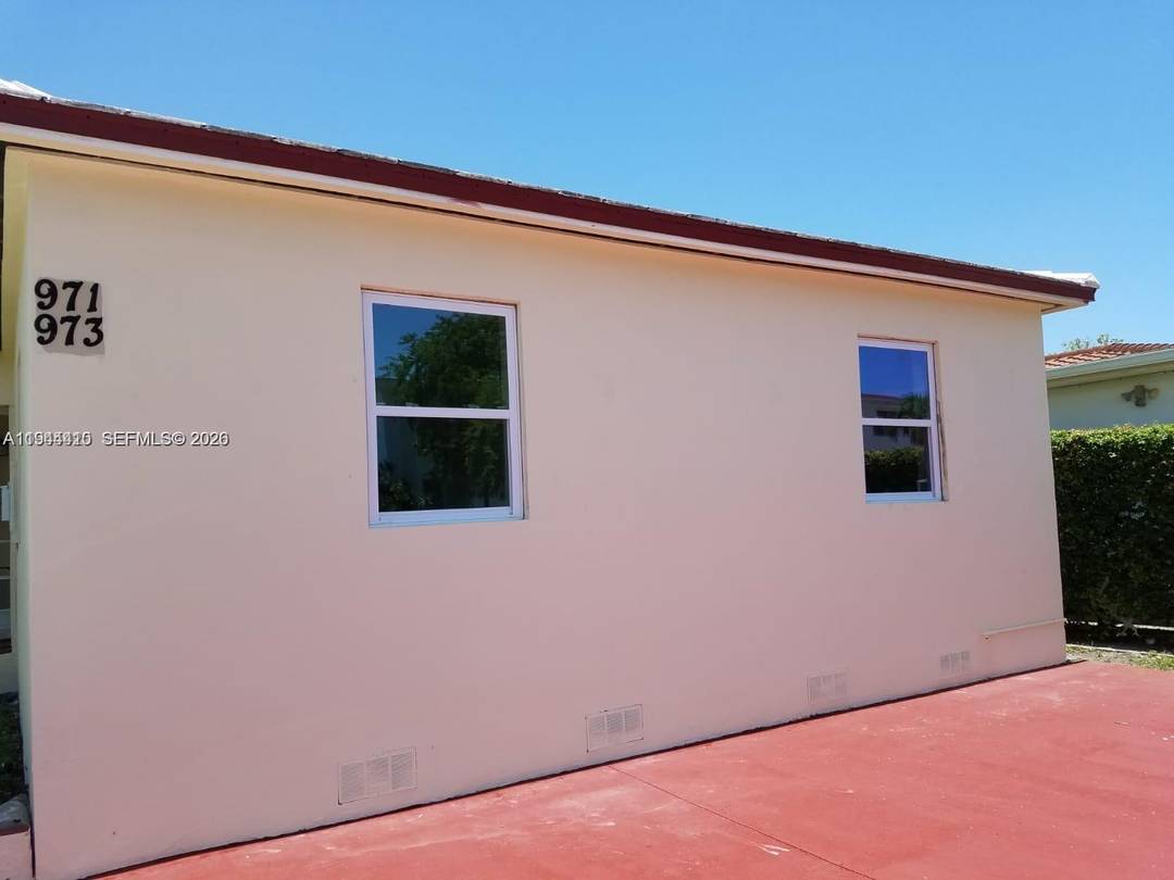 Beautiful duplex featuring two units, each offering 2 bedrooms, 1 bathroom, and a den.