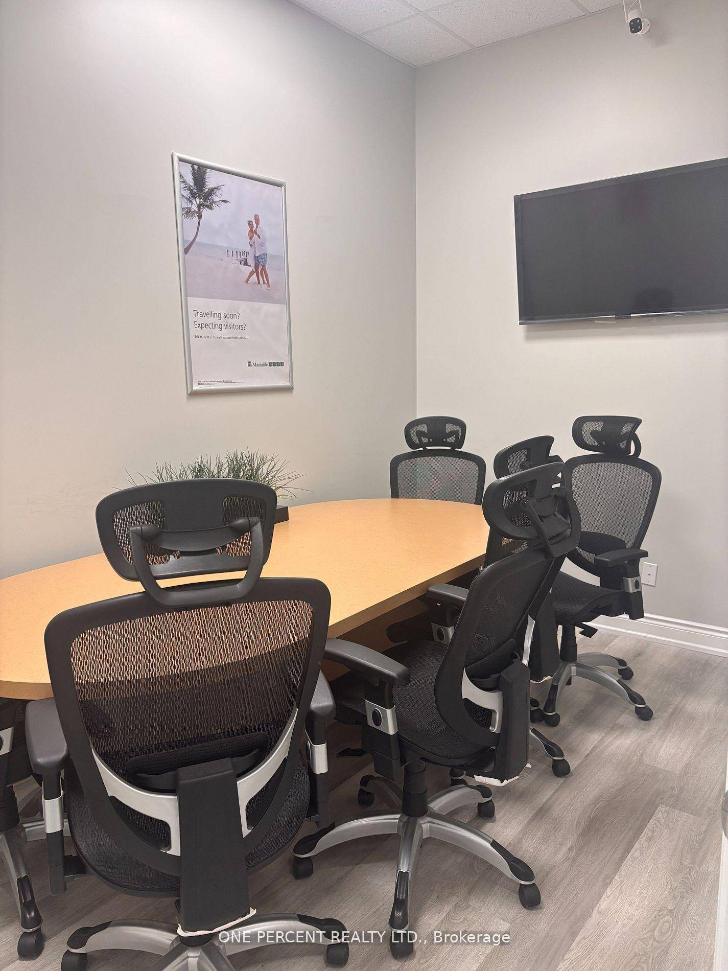 Professional, Super Clean, Modern Office Space Located in a Professional Two Storey Office Building with Elevator.