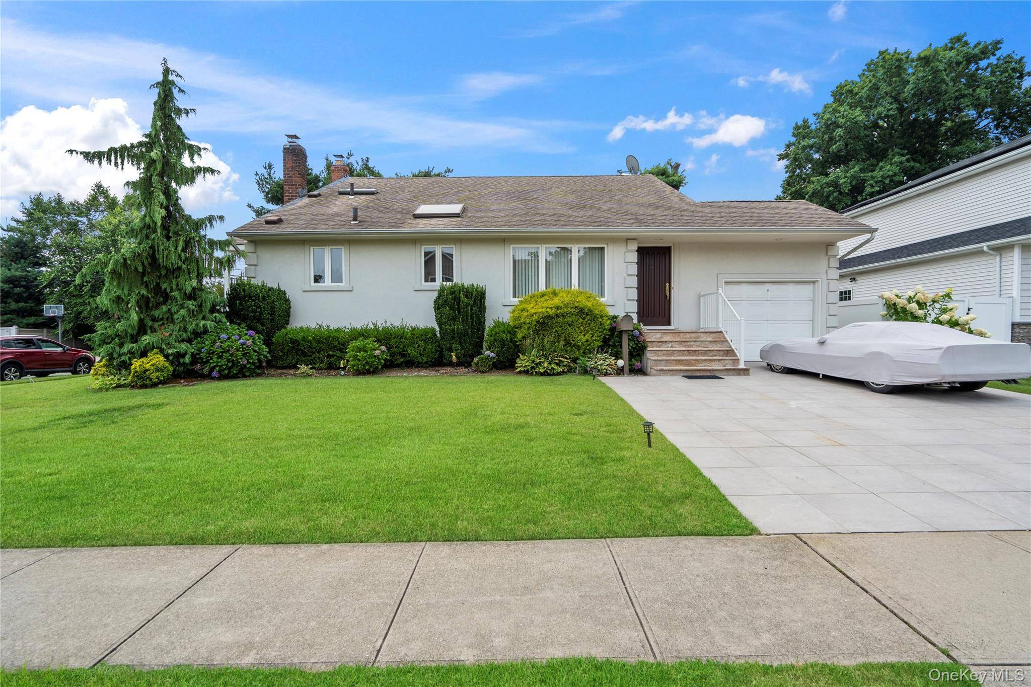 Stunning Split Level Home in Prestigious Neighborhood !