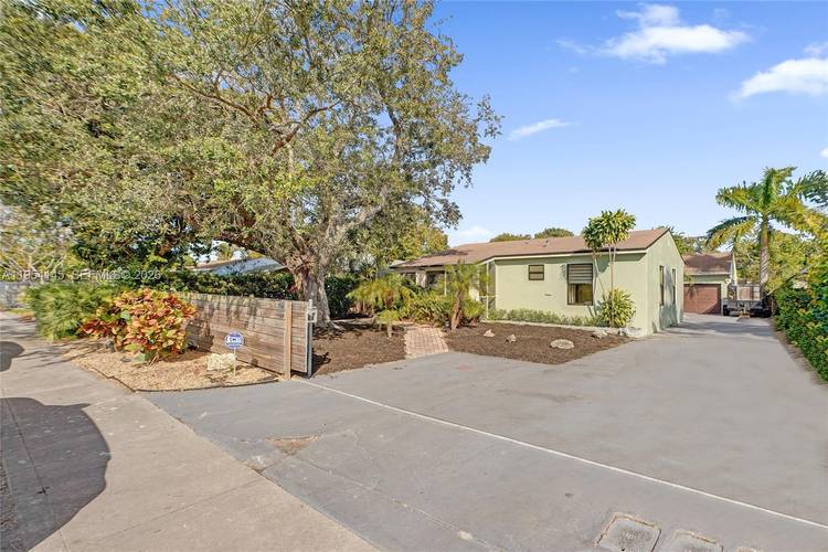 Remodeled split layout single family residence with strong income potential and flexible use.