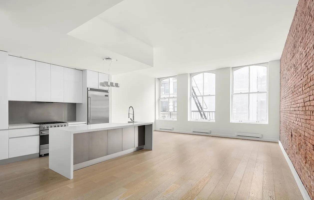 Discover refined loft living in this stunning 2 bedroom, 2 bathroom residence at 496 Broadway, Unit 3, situated in the vibrant heart of SoHo.
