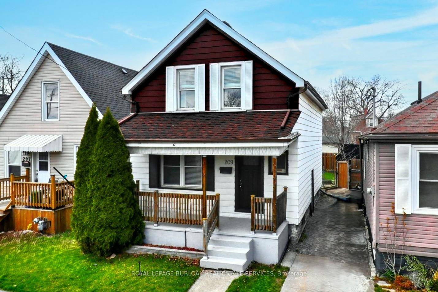 Step in off the covered porch and into this well cared for family home.