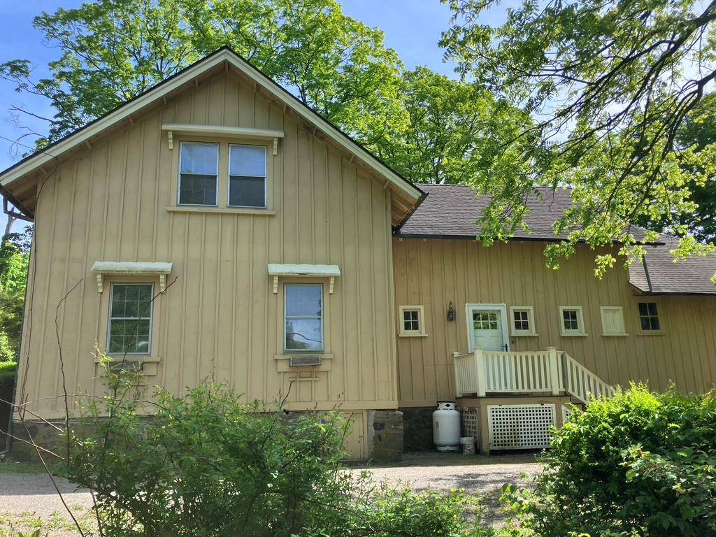 Super cute and spacious 1868 carriage house nestled on historic estate on one of Cold Spring's most enchanting country roads.