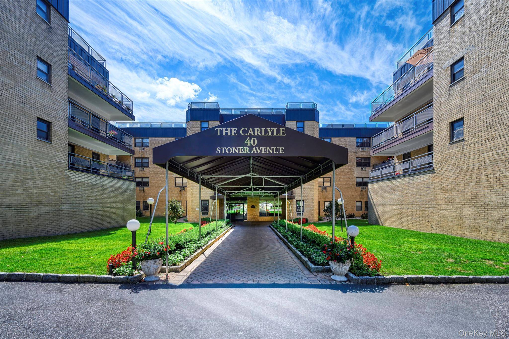 Fabulous Top Floor Corner Unit At The Carlyle, an Elegant, Premier Building Tucked Away on a Peaceful Residential Street in the Heart of Great Neck Plaza !