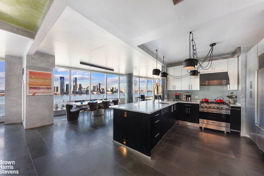 Welcome to Residence 17A at 10 Little West Street, a stunning completely renovated, custom designed 2 3 bedroom apartment.