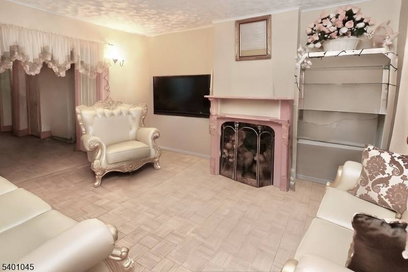 Welcome to 22 24 Kensington Place, a spacious side by side two family duplex in East Orange offering tremendous potential for owner occupants looking to build equity.