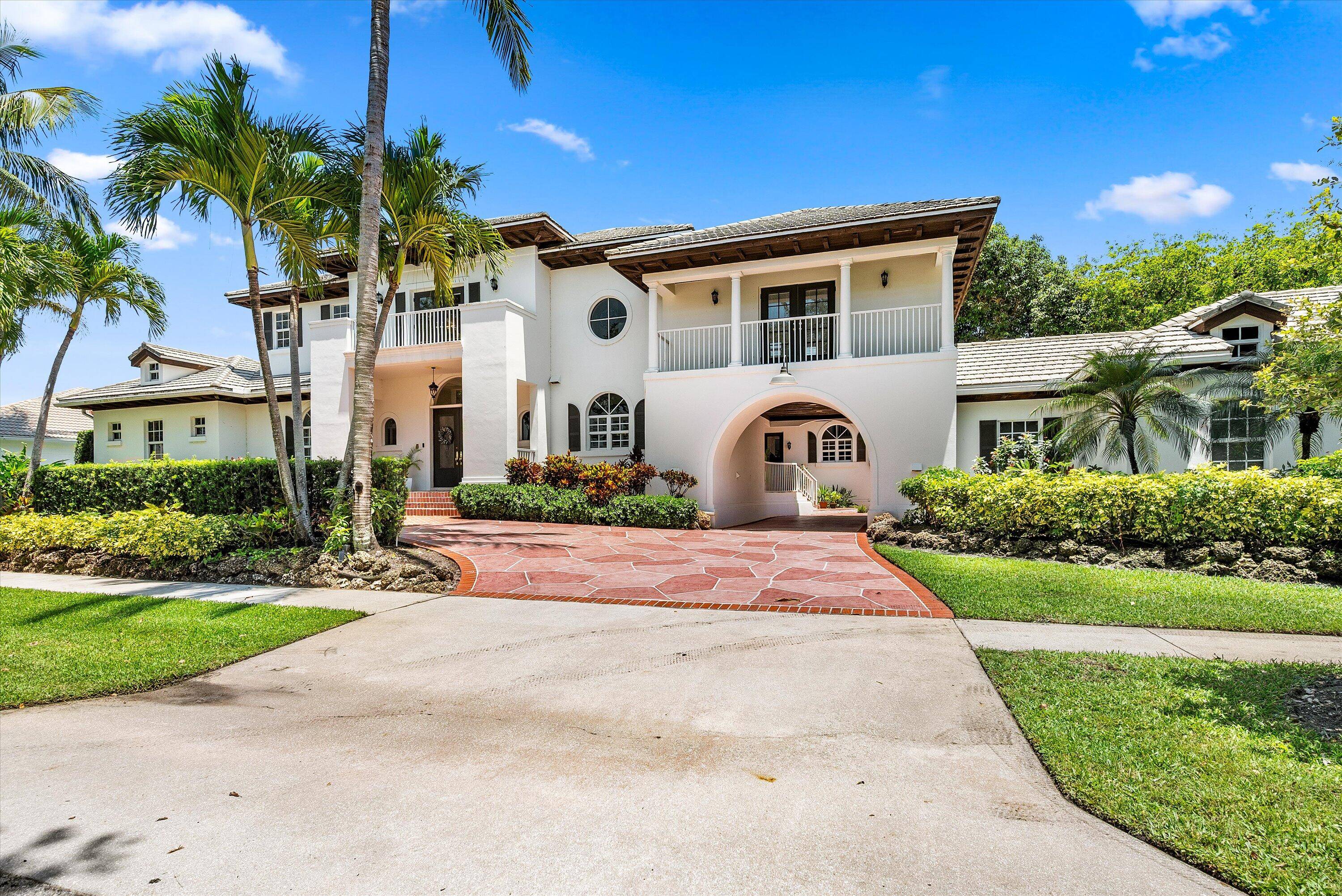 Live your best lifestyle at 2 Firestone Circle, an exquisite residence located in the prestigious and gated Presidential Estates.