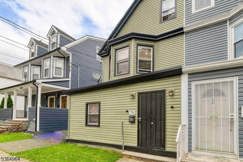 Opportunity knocks ! This 4 bedroom, 2 bath half duplex offers great potential for the savvy buyer or investor.