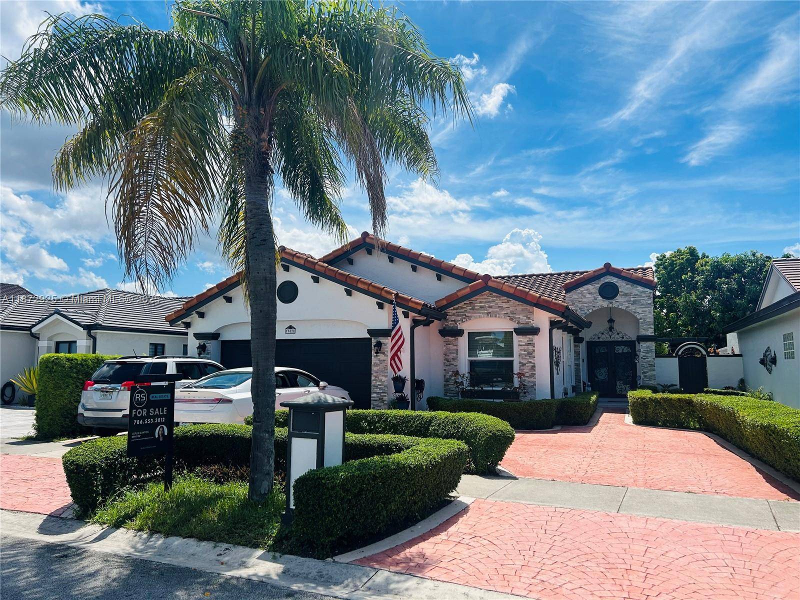 Dream Home Alert ! Exquisite renovated gem featuring a fully updated modern kitchen, impact resistant windows and doors, vaulted ceilings, spacious bedrooms, and a spa inspired master bath with both ...
